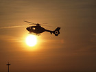 helicopter at sunset - MV252546